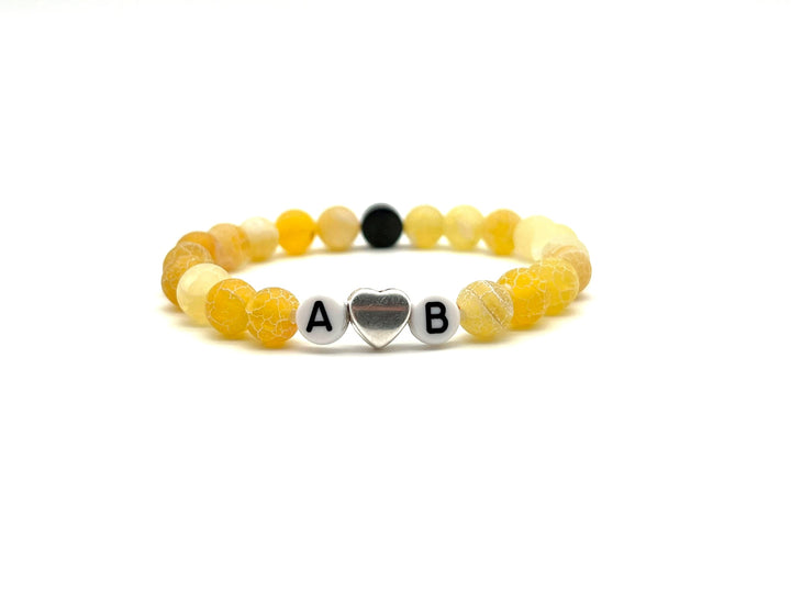 Partnerarmband Chalcedon gelb Buchstabe weiss Herz - Bracelettery