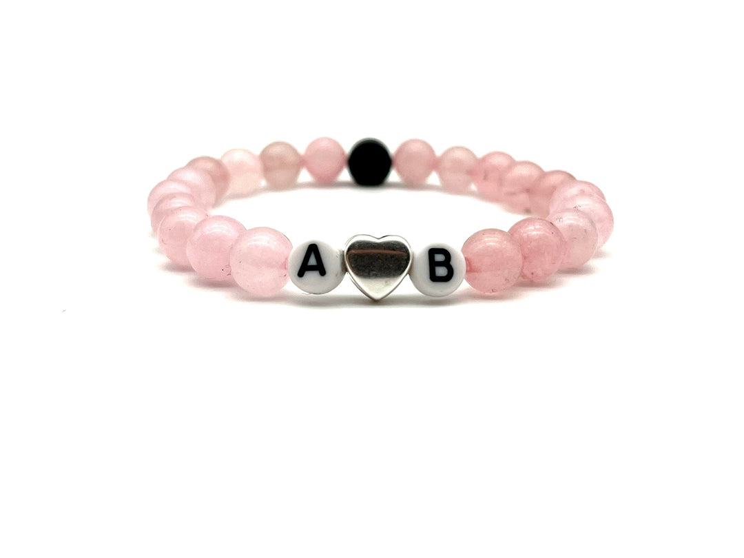 Partnerarmband Quarz pink Buchstabe weiss Herz - Bracelettery #farbe_silber