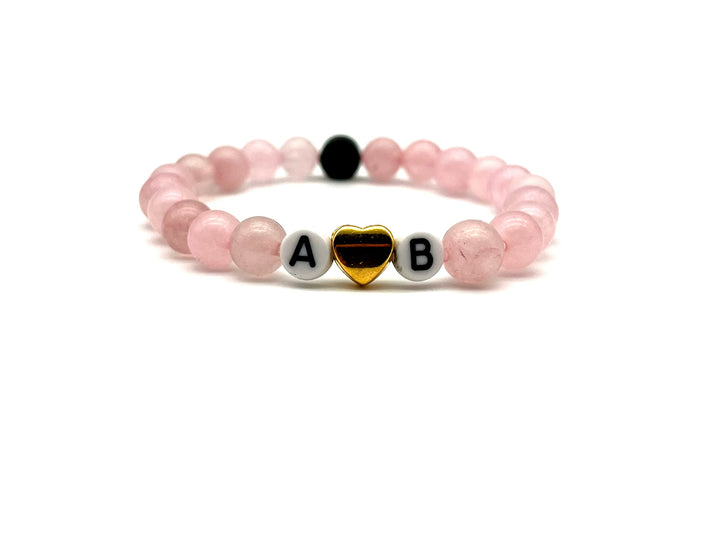 Partnerarmband Quarz pink Buchstabe weiss Herz - Bracelettery #farbe_gold